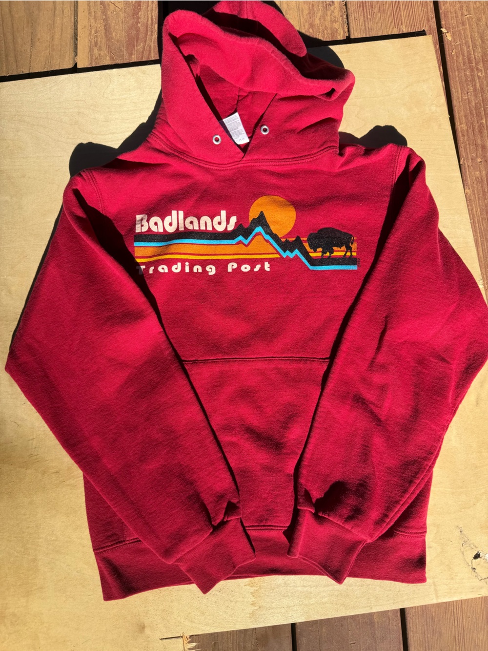 Jerzees Red Hooded Sweatshirt with Badlands Graphic